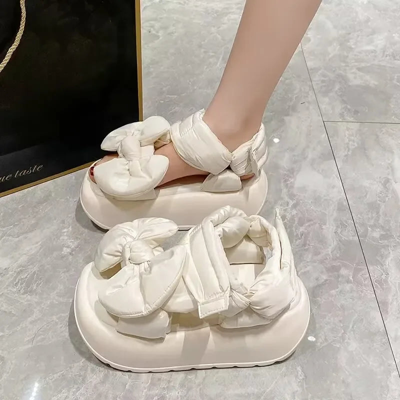 Stylish summer gladiator sandals for women, crafted from genuine leather with a chic butterfly-knot design, ideal for casual outings.