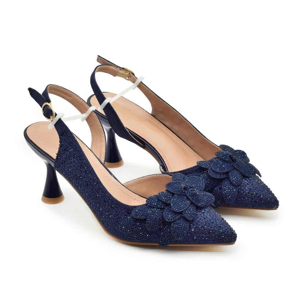 Matching designer handbag crafted with rhinestones, complementing the luxury women's high heel shoe set.