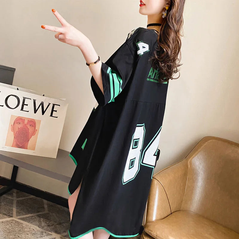 Elegant women's loose top in solid colour, featuring a chic O-neck and half sleeve design, ideal for casual summer outings.