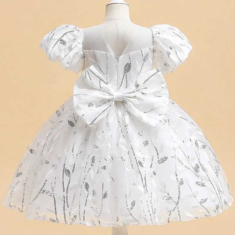 Luxury knee-length Girls' Party Dress in a festive patchwork design, ideal for special occasions and events, tailored for ages 2-12.