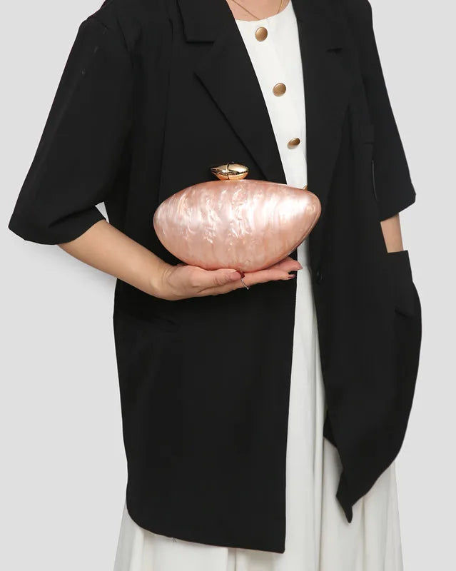 Luxury minaudiere clutch made from premium acrylic, perfect accessory for formal occasions.