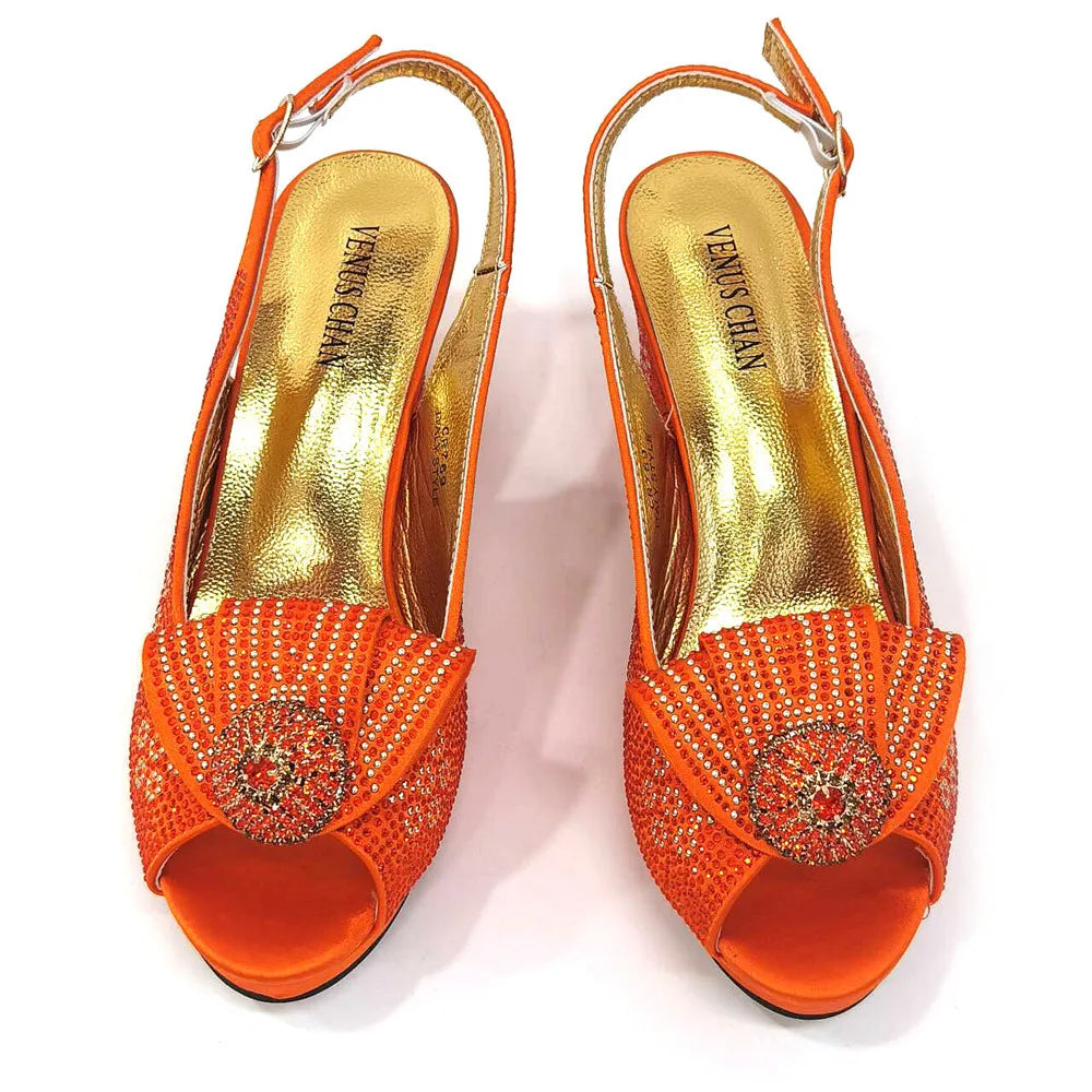 Stylish Venus Chan women's golden wedding shoes with peep toe design, featuring striking high heels and luxurious diamond embellishments.