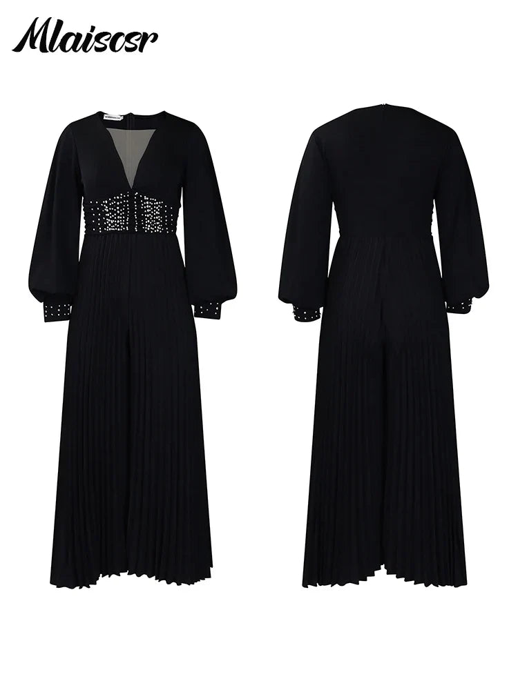 Chic full-length jumpsuit with loose fitting and embroidered flares by Mlaiscsr, designed for women who appreciate elegance in evening wear.