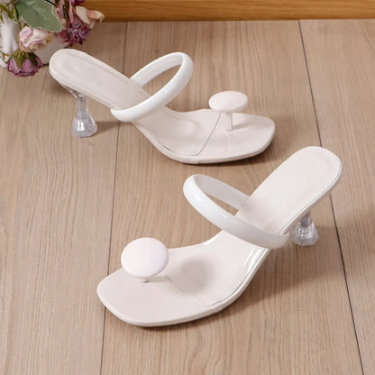 Beautifully crafted women's high heel sandals with a thin heel and modern design, epitomizing elegance and comfort for summer occasions.