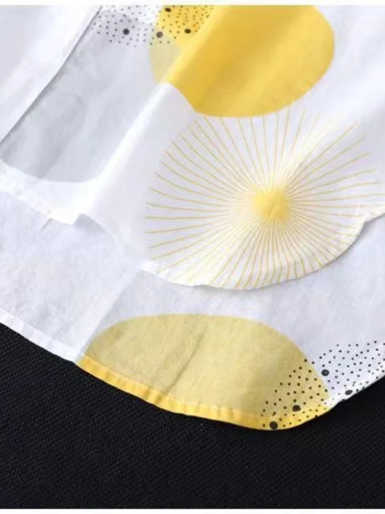 Slightly stretchy women's blouse featuring a trendy print, combining comfort and style effortlessly.