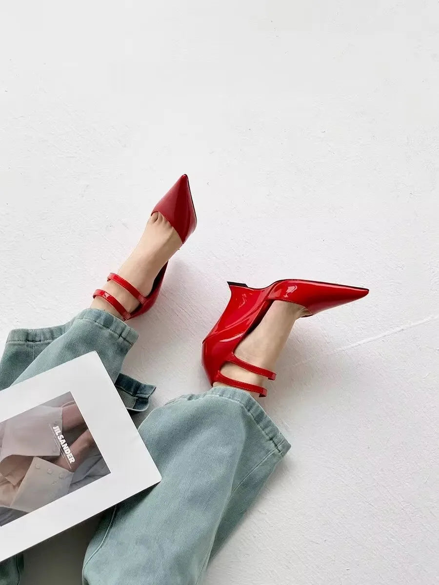 Chic women's wedge sandals with high heels, designed with pointed toes and a refined buckle closure, perfect for any elegant outfit.