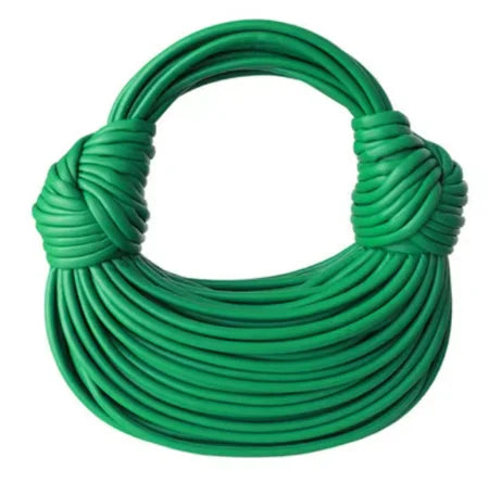 Fashion-forward shoulder bag with a practical zipper closure, combining elegance and functionality in a lavish handwoven design.