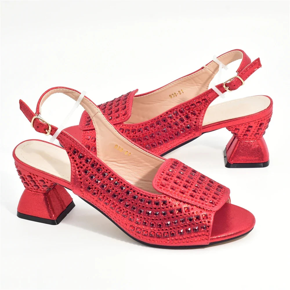 Elegant women's Italian high heel pumps in silver with rhinestone embellishments, part of a luxurious matching shoe and bag set.