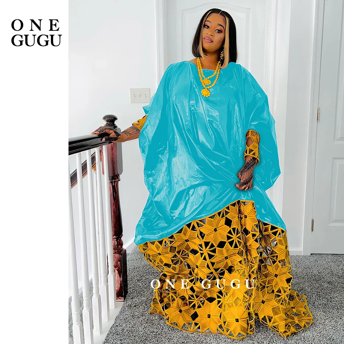 Stylish women’s African Dashiki gown in gold and white, featuring a pullover design and crafted from premium cotton and polyester material.