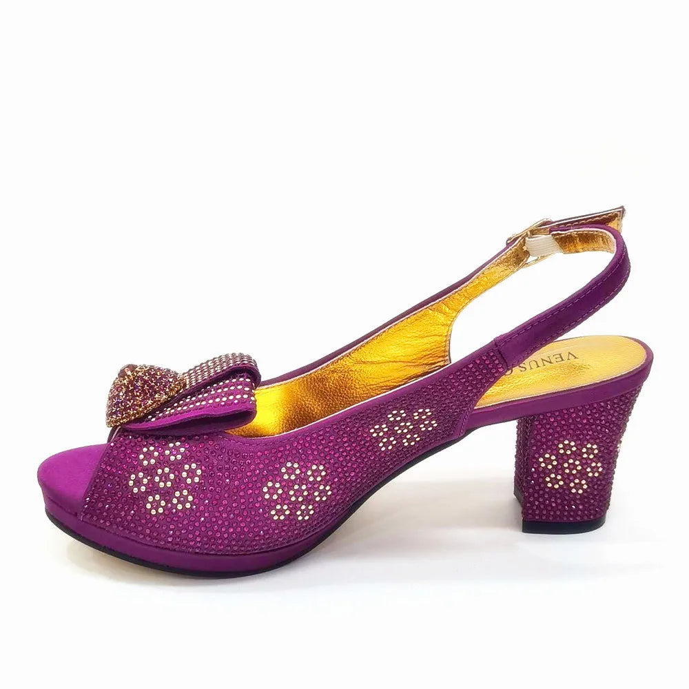 Elegant Venus Chan women's wedding shoes with luxurious golden finish and bling, crafted for high-fashion appeal and comfort during celebrations.