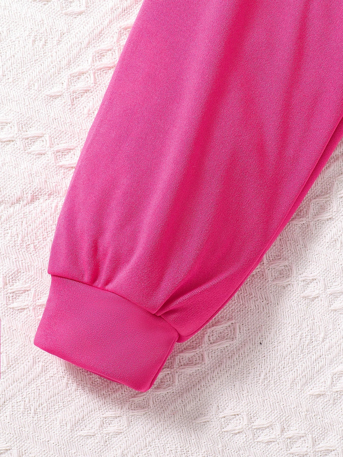 Stylish display of the round neck top from the girls' autumn fashion set, designed for comfort and elegance in ages 7-13.