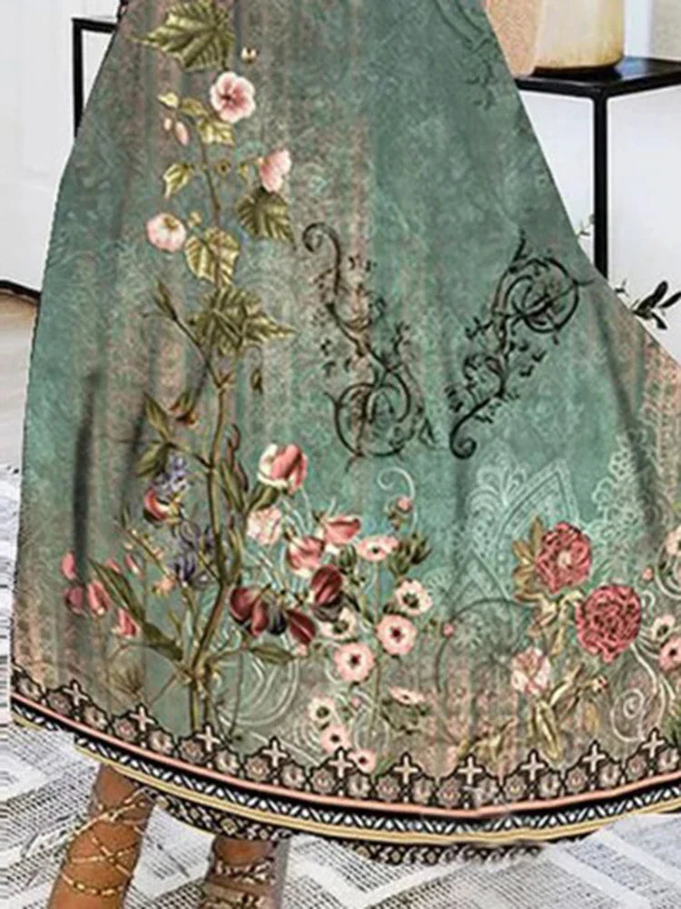 Close-up of the vintage floral print on a luxurious polyester autumn maxi dress, ideal for sophisticated wardrobe.