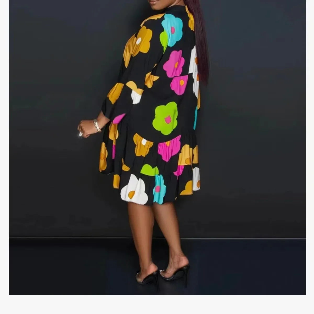 Chic autumn women's fashionable printed jumpsuit featuring a loose long sleeve design and elegant V-neck, perfect for stylish mid-age women.