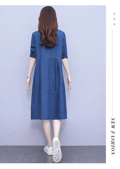 Luxe oversized denim dress for women, 5XL size with elegant A-line design, short sleeves, and convenient pockets, combining comfort and style.