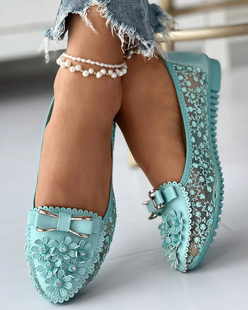 Luxurious women's summer loafers featuring breathable floral embroidery and a stylish bowknot design, perfect for casual elegance.