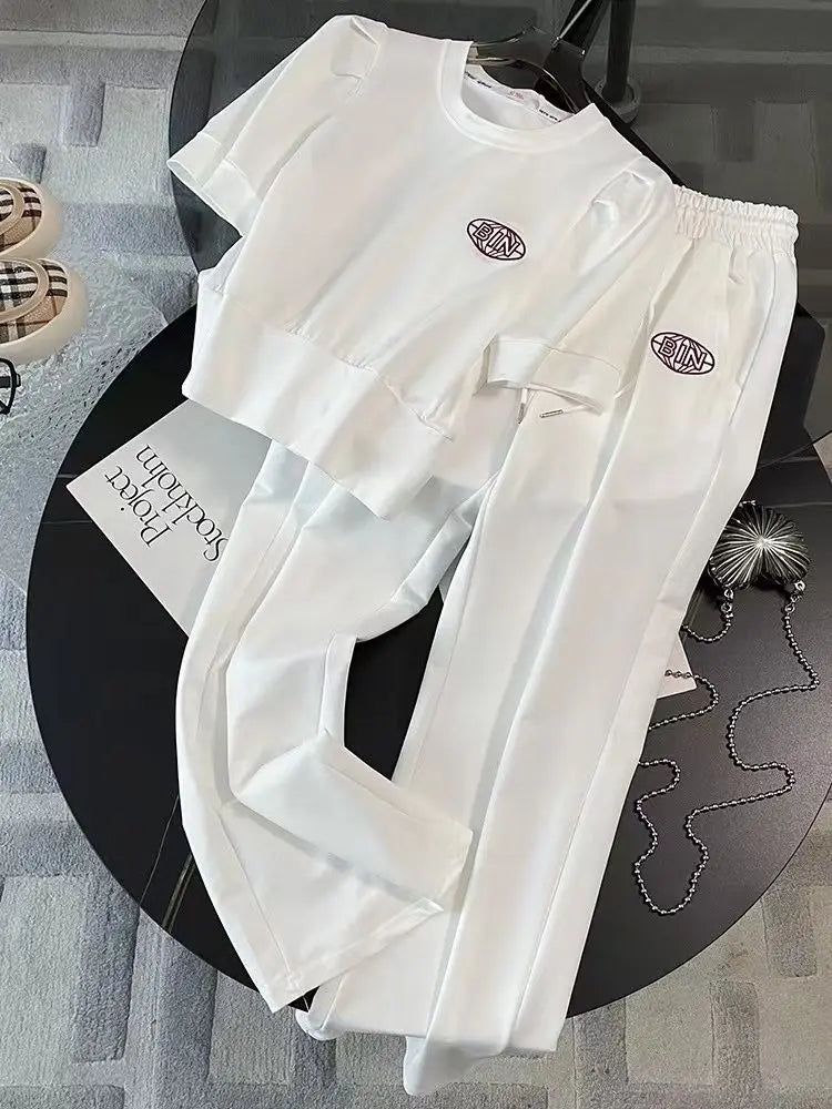 Close-up of the luxurious short sleeve t-shirt from the women's summer sports set, showcasing high-quality fabric and sweet style.