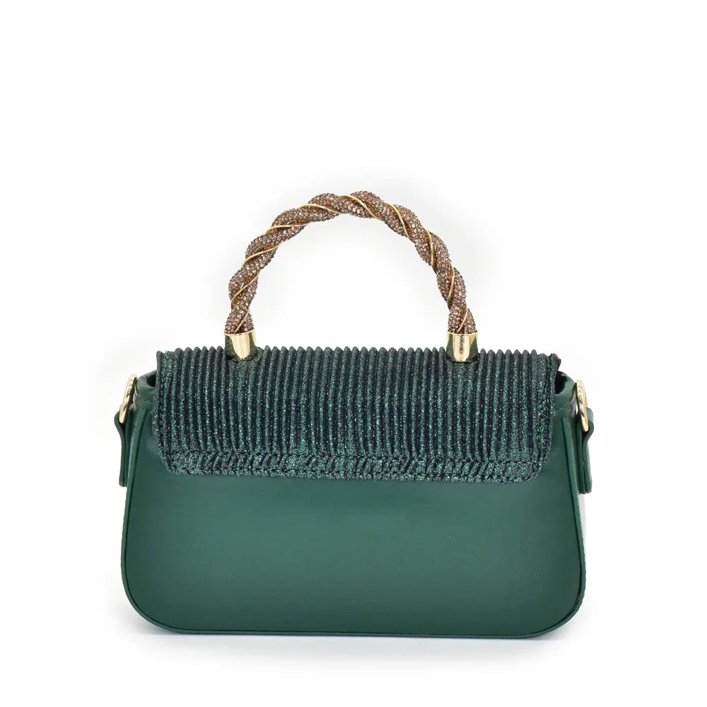 Glamorous Italian women's heeled pumps alongside a coordinating bag, adorned with crystal embellishments, perfect for upscale parties.