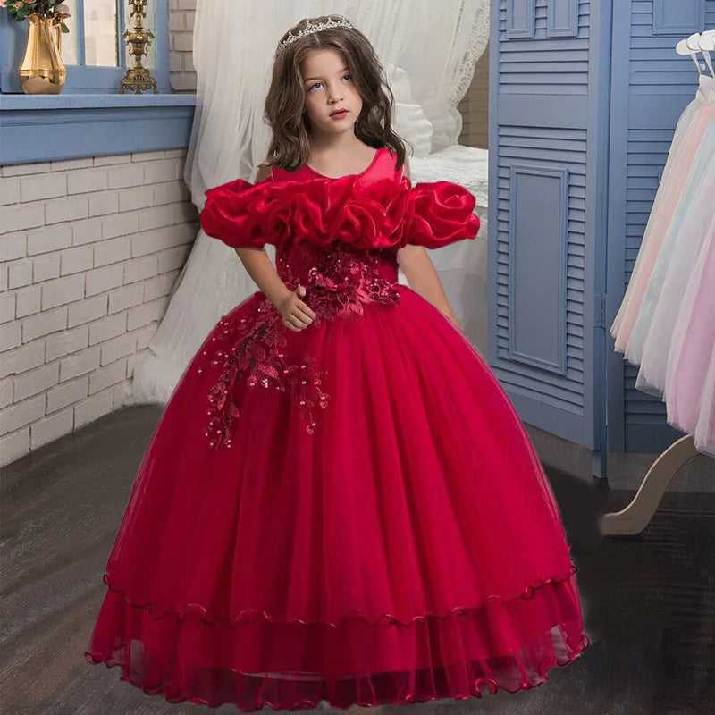 Elegant girls' long evening dress with embroidered mesh and pearl details, perfect for special occasions, available in sizes 4-13 years.