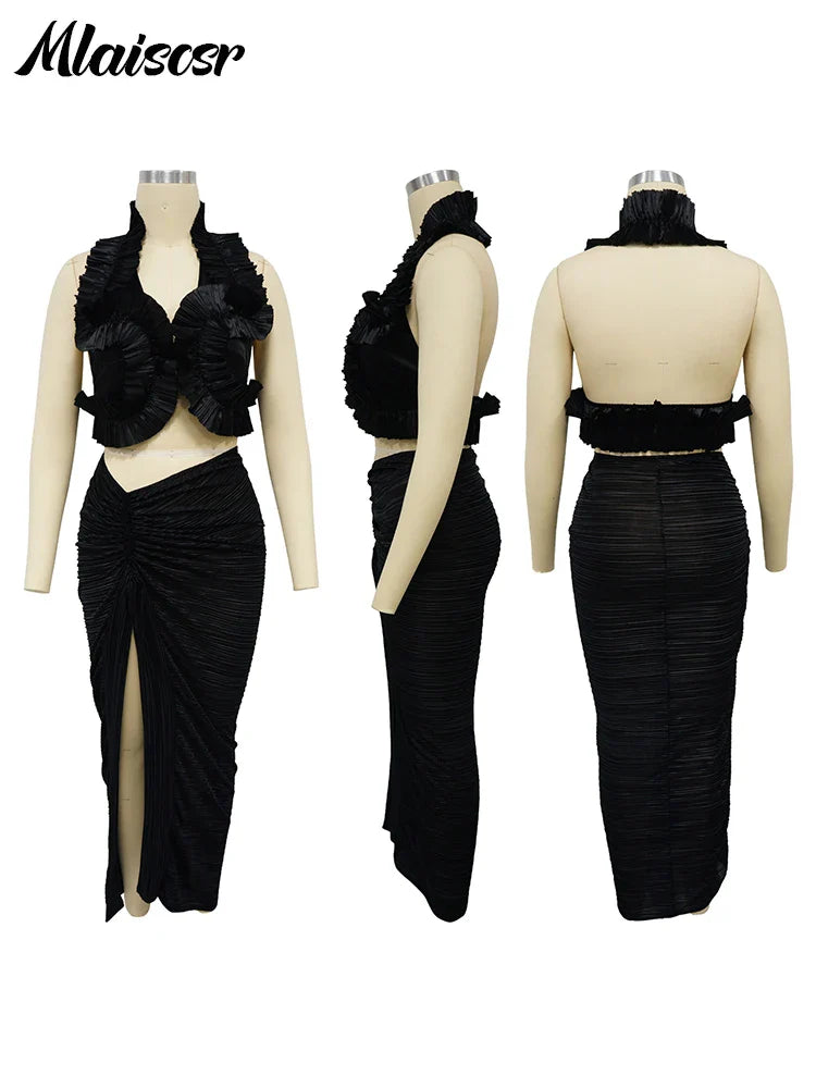 Stylish view of the pleated split skirt from the Mlaiscsr Elegant Black Dress Set, designed with an elastic waist for comfort and allure, perfect for fashionable outings.