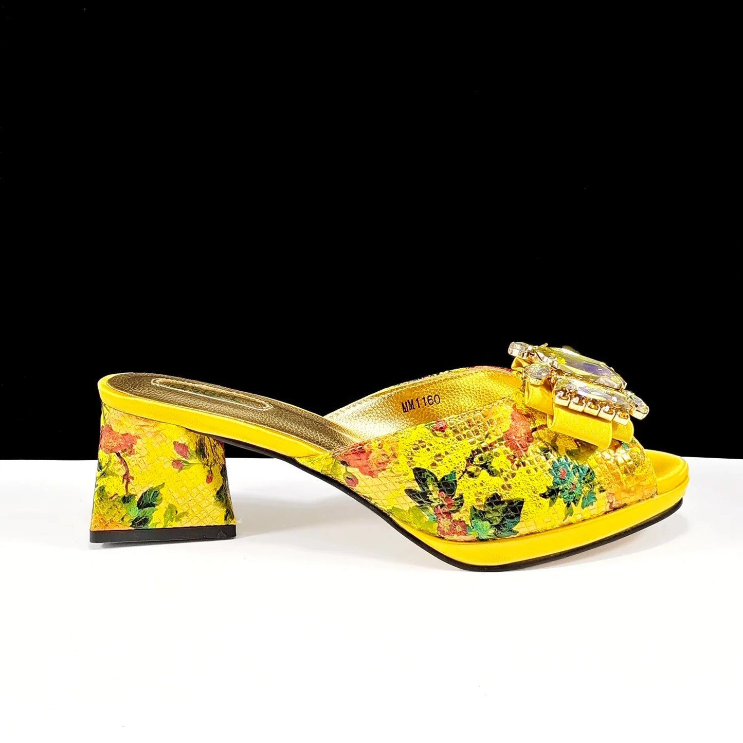 Sleek bottom view of QSGFC rhinestone-decorated purple sandals, emphasizing the high-quality materials and handmade craftsmanship.