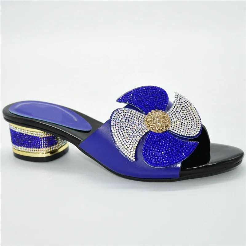 Fashion-forward women's slip-on sandals with a chic round toe and metallic accents, available in sizes 38-43, perfect for a luxurious outfit.