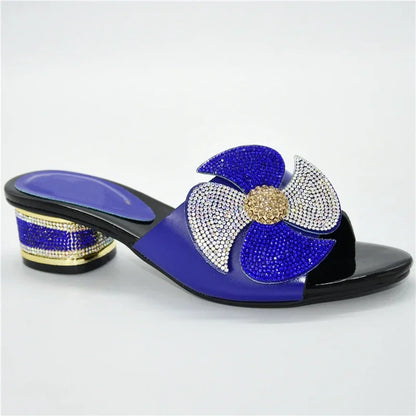 Fashion-forward women's slip-on sandals with a chic round toe and metallic accents, available in sizes 38-43, perfect for a luxurious outfit.