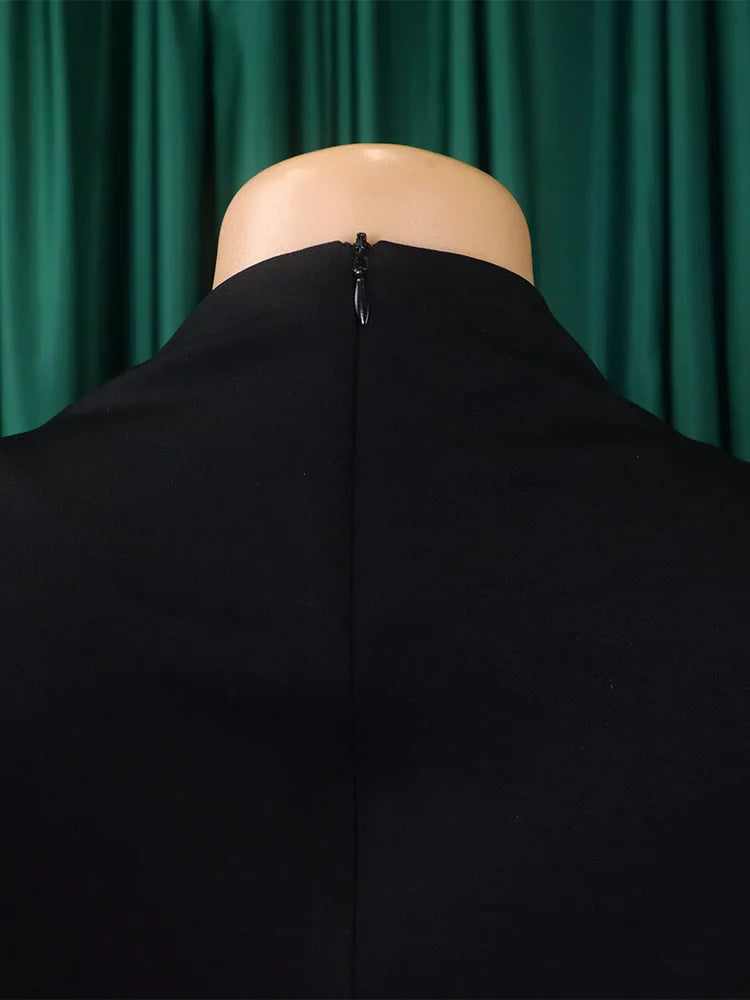 Chic plus size women's dress with half high collar and slim fit, showcasing exquisite craftsmanship in vibrant Ankara fabric.