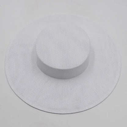 Artfully designed sinamay fascinator hat showcasing intricate craftsmanship, ideal for formal occasions.