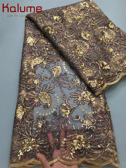 Vibrant party-ready Kalume lace fabric showcasing intricate designs, tailored for elegance and upscale events.