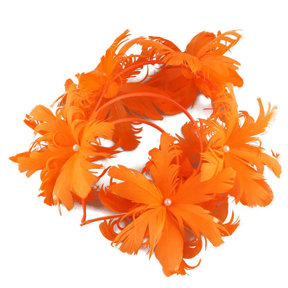 Fashionable blue feather wedding fascinator styled on a model, showcasing its versatility for various events including parties and cocktail gatherings.