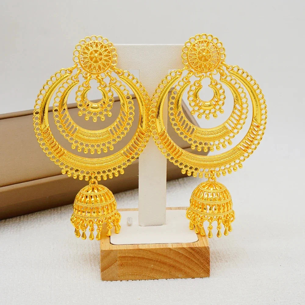 Trendy drop earrings for women featuring a unique geometric design in a stunning gold colour finish, ideal for special occasions.