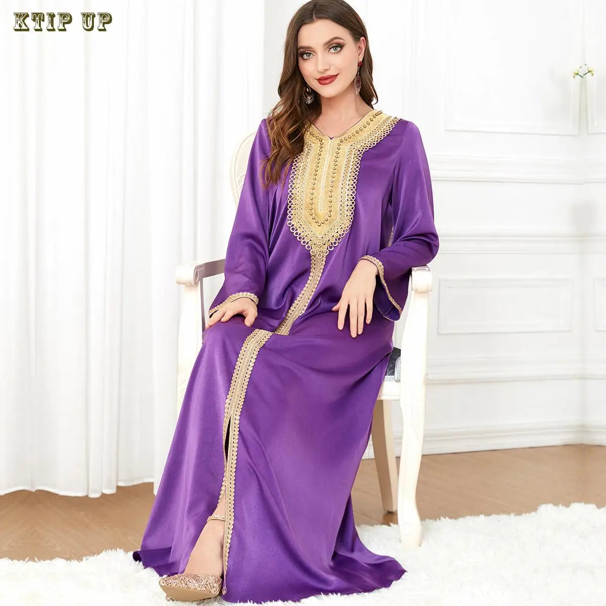 Elegant golden velvet abaya featuring luxurious bat sleeves adorned with sequins, perfect for Ramadan fashion.