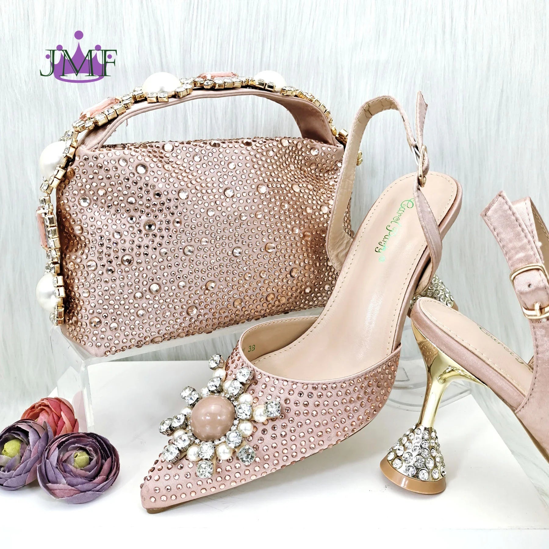 Elegant Italian design blue women's stiletto heels sandals adorned with rhinestones and pearls, showcasing luxury with a fashionable touch.