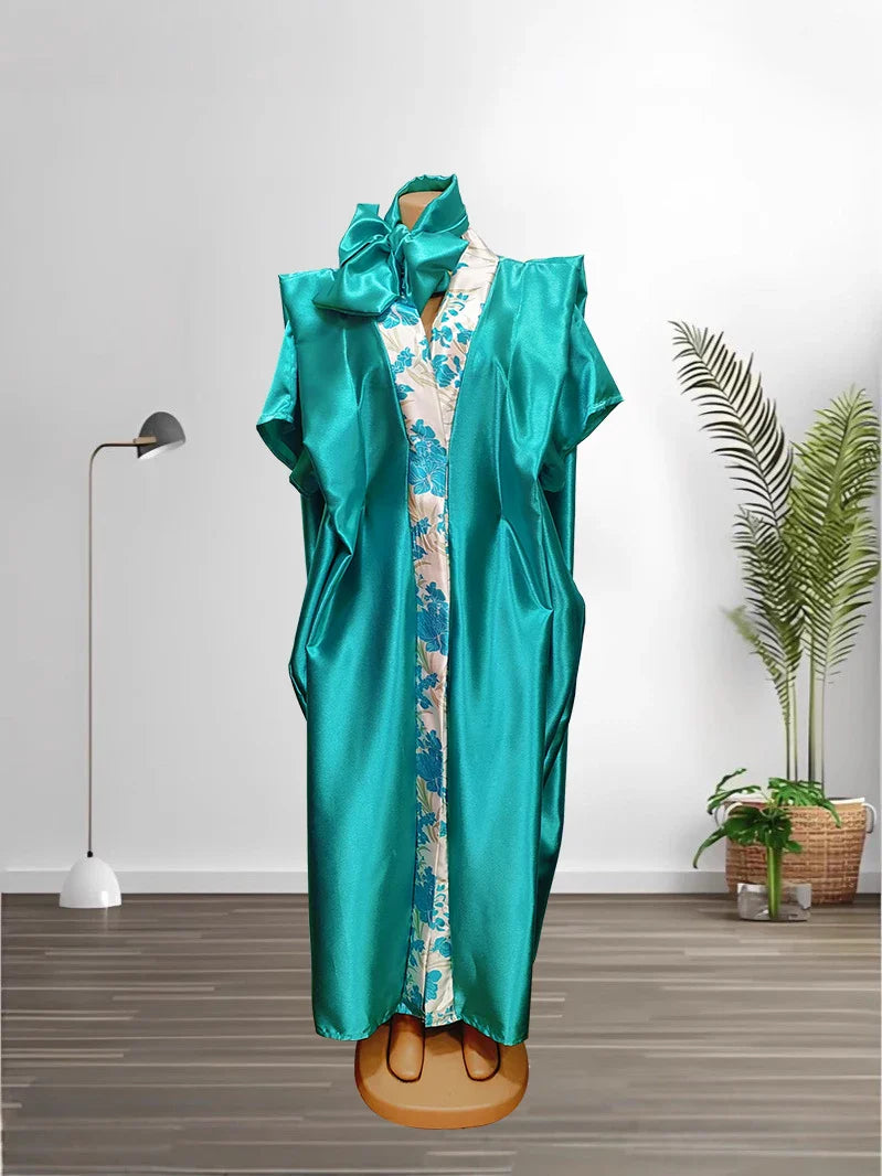 Luxurious African evening dress with a flattering fit, combining modern style with traditional Kanga clothing elements for a unique look.