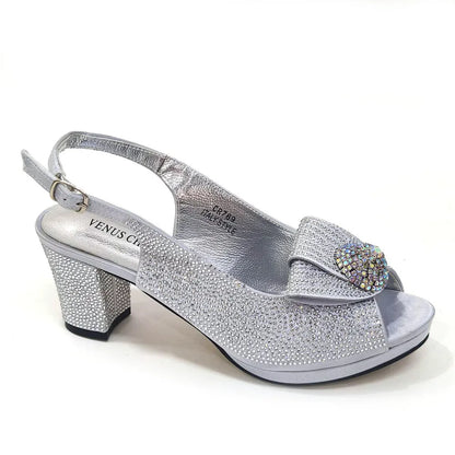 Elegant golden wedding bag crafted to match Venus Chan high spike heels, featuring intricate bling detailing.