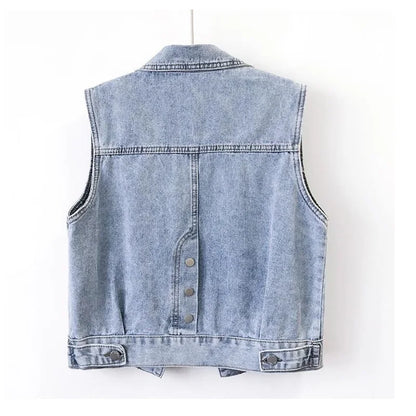 Elegant women's denim vest jacket adorned with sequins, perfect for casual outings, showcasing a short, tailored fit with pockets.