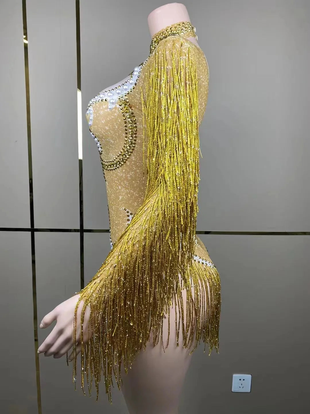 Elegant model wearing a luxury women's cha-cha dance practice suit with a slim stretch skirt and intricate fringe design, perfect for dance enthusiasts.