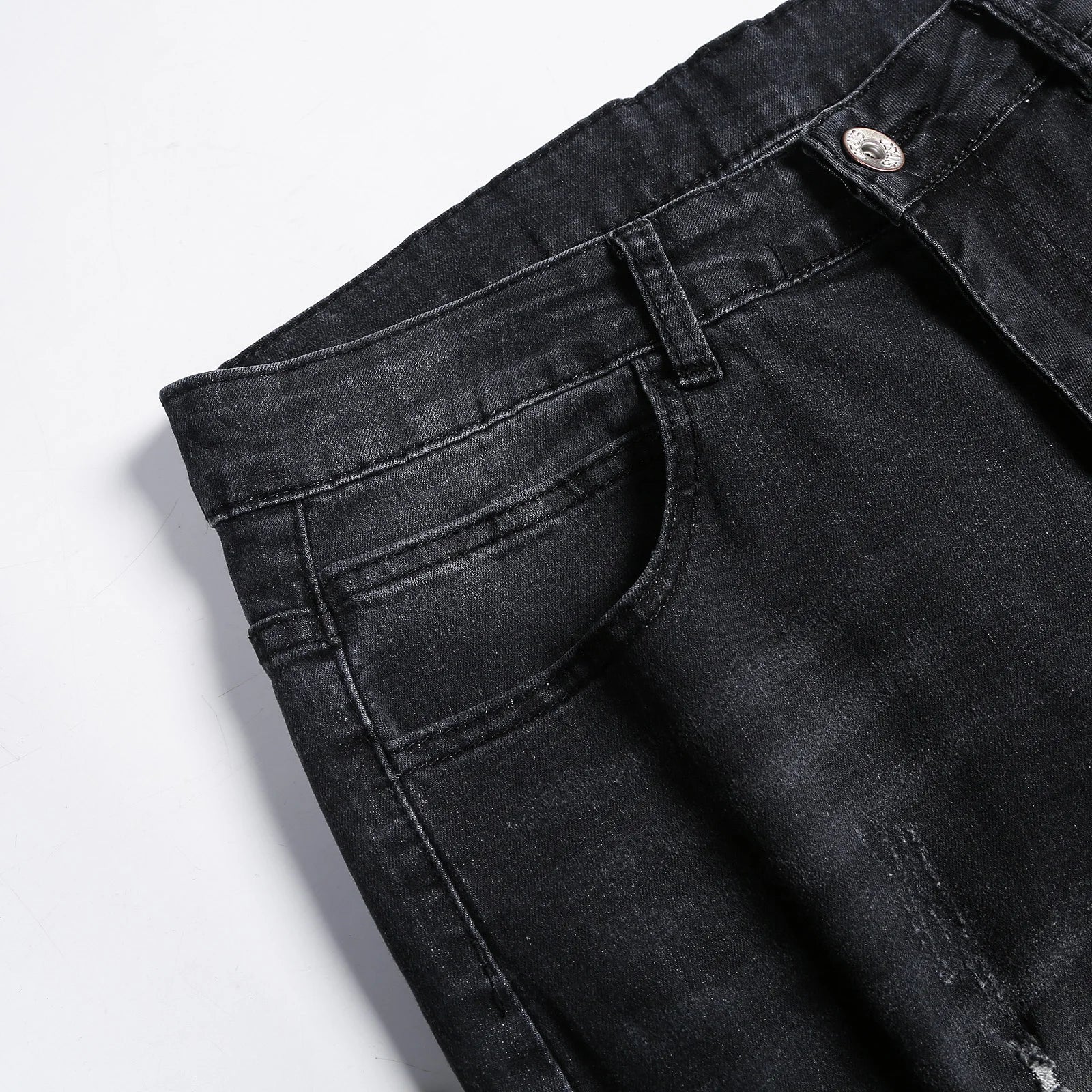 Luxury Men's Ripped Skinny Jeans featuring vintage stonewashed denim for a stylish, modern look; perfect for casual attire.