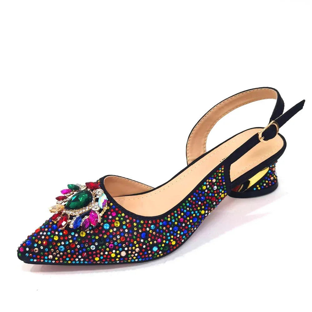 Beautifully crafted women's low heels from Italy featuring a chic pointed toe and elegant slingback, presented with a matching bag for a refined look.