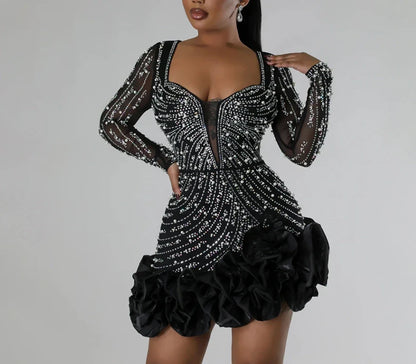 Elegant women's sexy dress featuring intricate rhinestone beading and delicate appliques, tailored for an above-knee silhouette, perfect for luxurious clubwear.