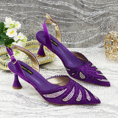 Close-up view of high-quality pointed toe pump shoes embellished with diamonds, perfect for special events.