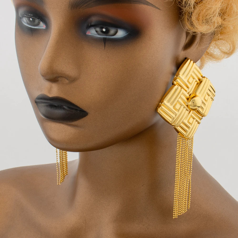 Luxury Bohemian gold color tassel drop earrings for women, perfect for ethnic weddings and parties, showcasing exquisite craftsmanship.