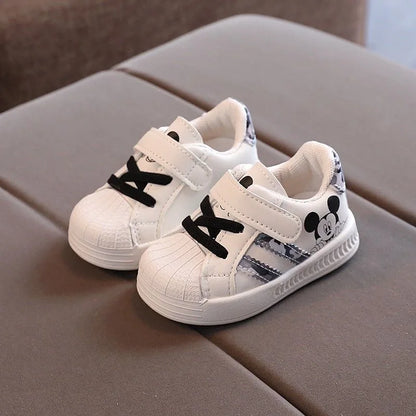Elegant pair of Mickey Mouse Sneakers for children, designed for all seasons with a hook and loop closure, ideal for stylish and active little ones.