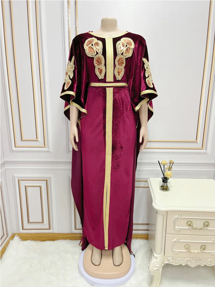 Luxurious long dress displayed elegantly, showcasing the comfortable fit and refined style of the full golden velvet abaya perfect for Ramadan celebrations.