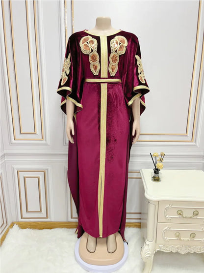 Luxurious long dress displayed elegantly, showcasing the comfortable fit and refined style of the full golden velvet abaya perfect for Ramadan celebrations.
