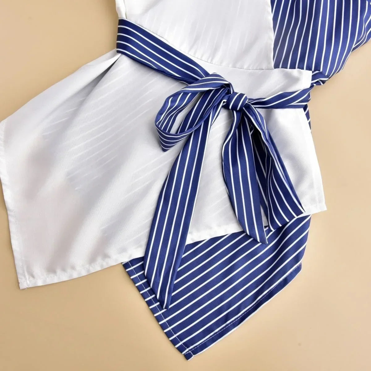 Luxury women's plus size summer two-piece set featuring a stylish shirt and elegant pants in a slimming patchwork design, perfect for casual outdoor events.