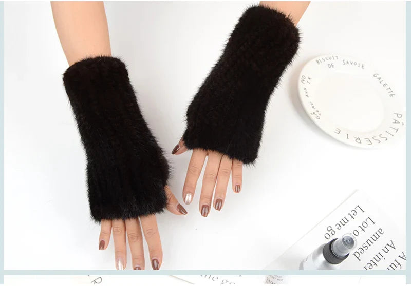 Luxury women's half finger knitted gloves made from 100% real mink fur for warmth and style, perfect for comfortable typing.