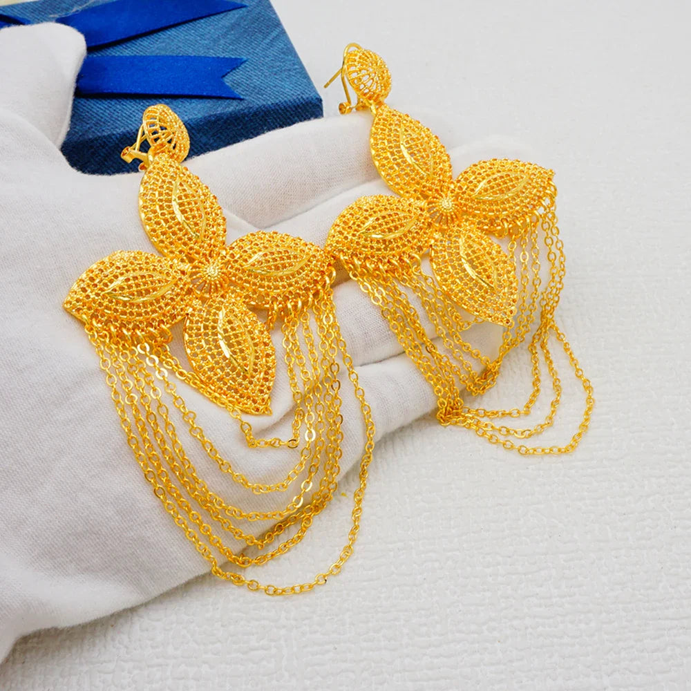 Sophisticated Bohemian Style Gold Tassel Drop Earrings, highlighting exquisite craftsmanship and a fashionable design, suited for elegant casual or formal wear.