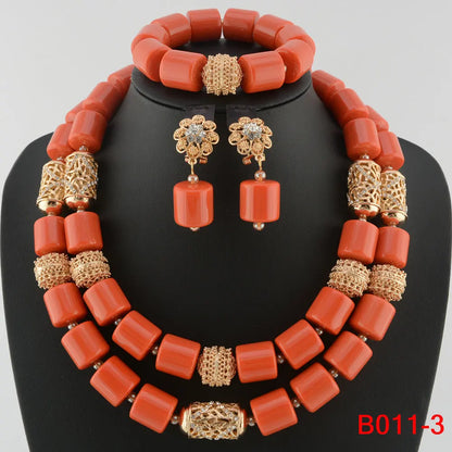 Complete African wedding jewelry set displayed elegantly, including necklace, earrings, and bracelet, made of premium resin beads for women.