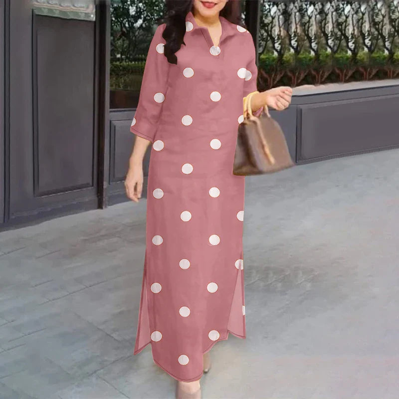 Elegant plus-size women's ankle-length summer sundress featuring a sophisticated polka dot pattern, lapel neck design, and three-quarter sleeves, perfect for casual outings.